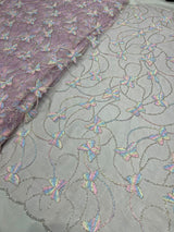 Multi thread embroidery fabric