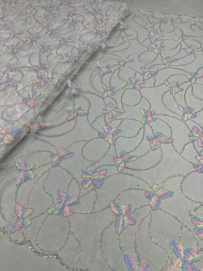 Multi thread embroidery fabric