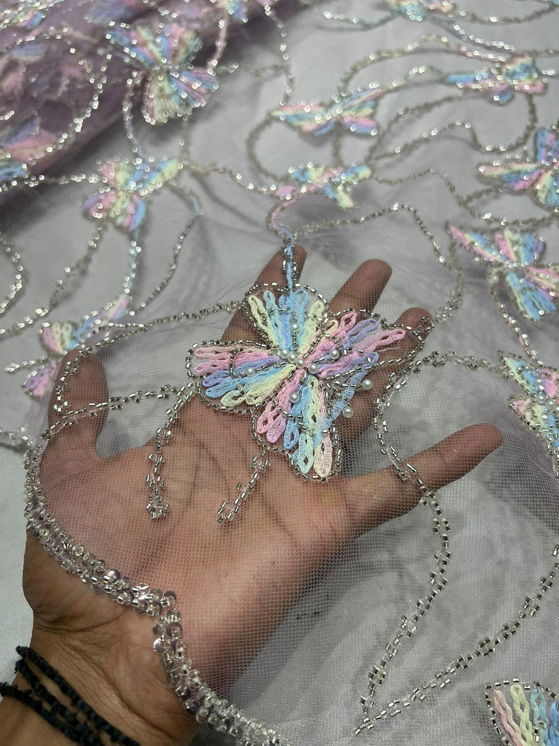 Multi thread embroidery fabric