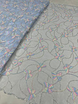 Multi thread embroidery fabric