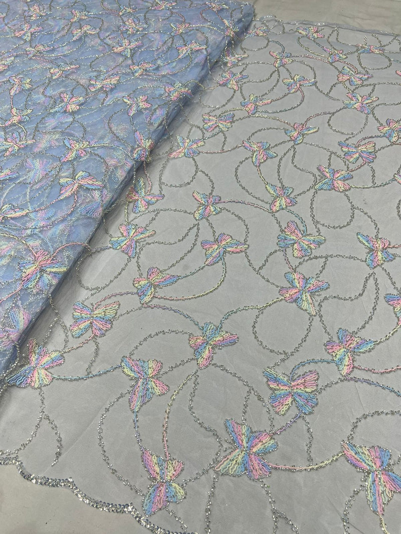 Multi thread embroidery fabric