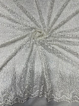 Net thread+embelished sequence embroidery