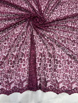 Net thread+embelished sequence embroidery