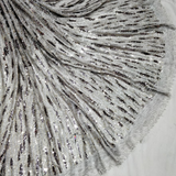 Sequin Tassles on fur nett, 58”